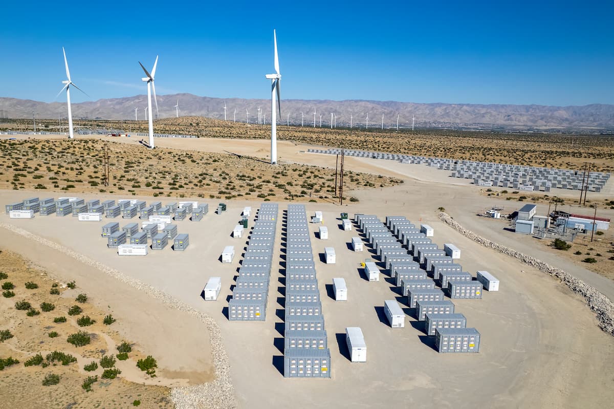 BESS site and wind turbines in the desert